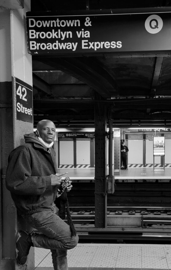 This is me in Midtown Manhattan posting up while waiting on the Q train to Brooklyn. The New York City Subway is by far the largest rapid transit system in the country in terms of annual ridership volume. It also has the most stations (472) among all transit systems worldwide.