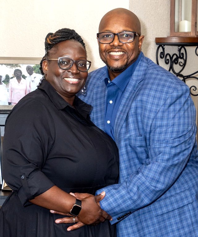 Willie Addison Jr. is all smiles as he embraces his wife, Sonya. They have been married nearly 34 years.