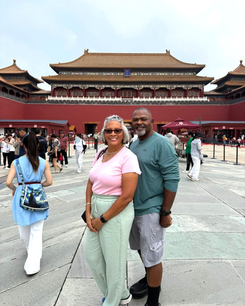 Jonathan and Renee Moyd posse for a photo at the Forbidden City.